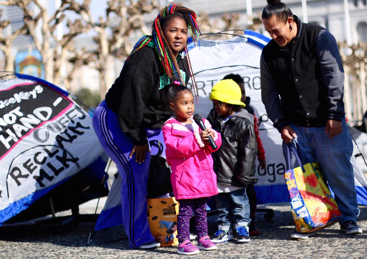 A girl at the Citywide Homeless People’s Assembly outside San Francisco’s City Hall