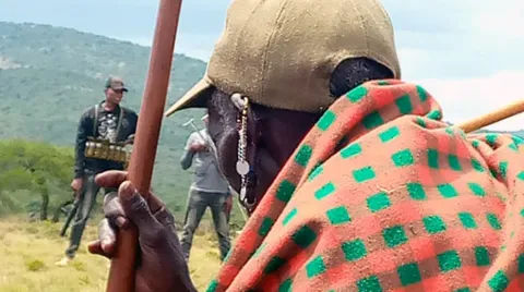 Armed police forces arrive to begin demarcation process in Loliondo. 