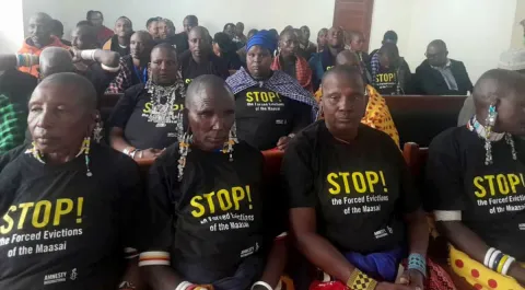 Maasai community members await the High Court of Tanzania ruling in October 2024