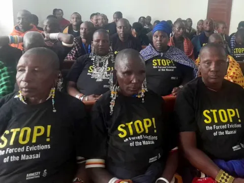 Maasai community members await the High Court of Tanzania ruling in October 2024