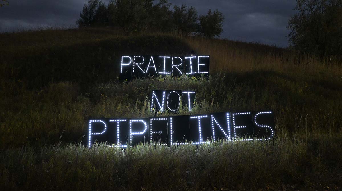 Lightboard art in protest of proposed carbon pipelines