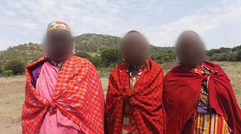Maasai villagers, their faces are hidden for their protection. Credit: Oakland Institute